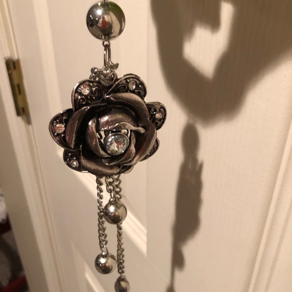 Scarf with attached pendant